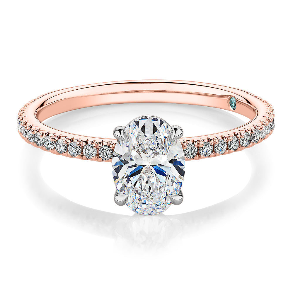 Premium Certified Laboratory Created Diamond, 1.24 carat TW oval and round brilliant shouldered engagement ring in 18 carat rose and white gold