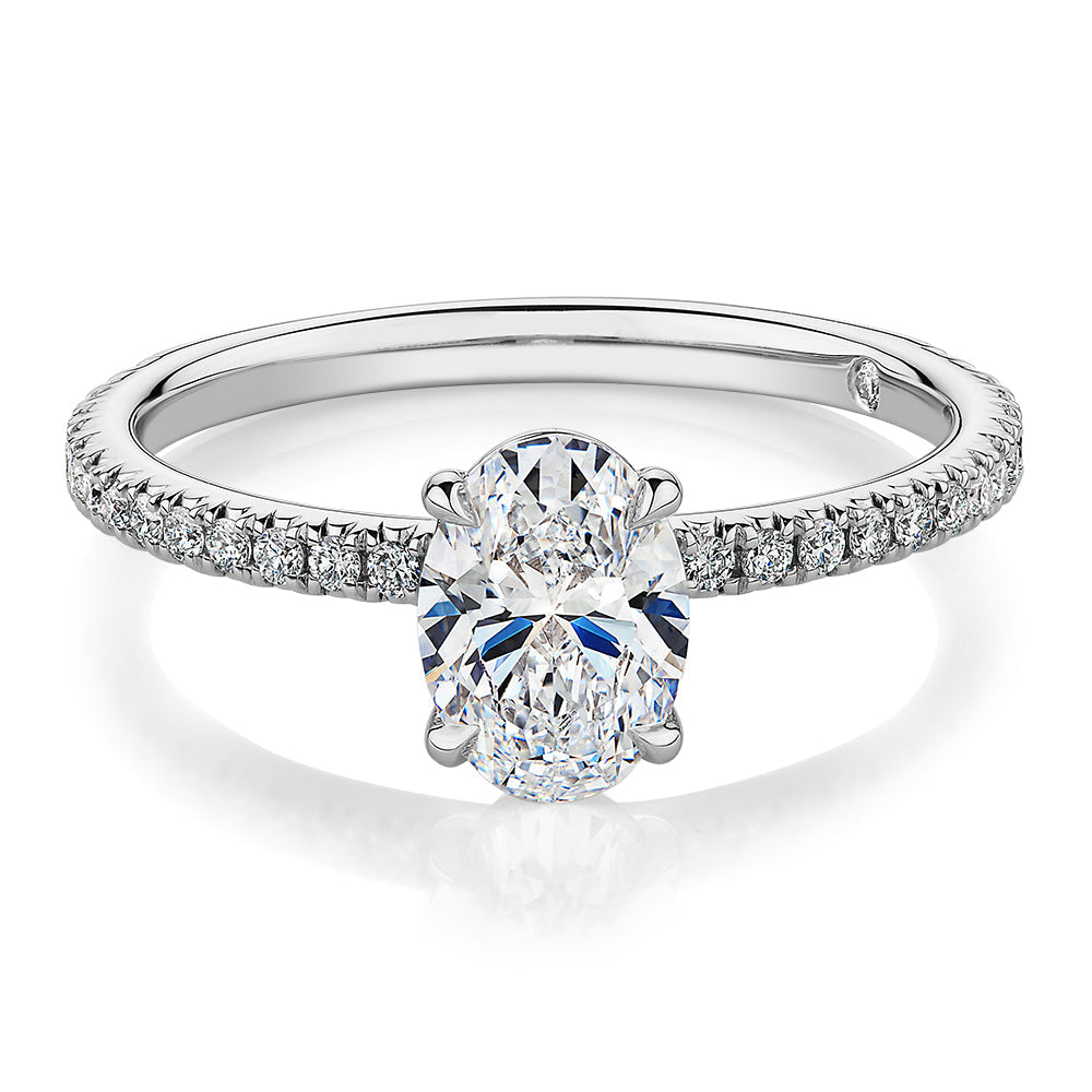 Signature Simulant Diamond 1.19 carat* TW oval cut shouldered engagement ring in 10 carat white gold