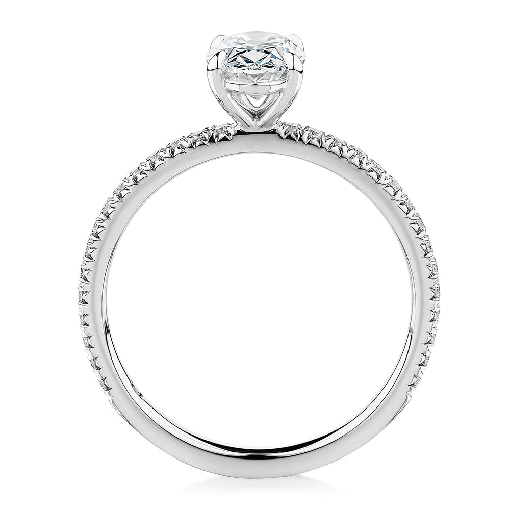 Signature Simulant Diamond 1.19 carat* TW oval cut shouldered engagement ring in 10 carat white gold