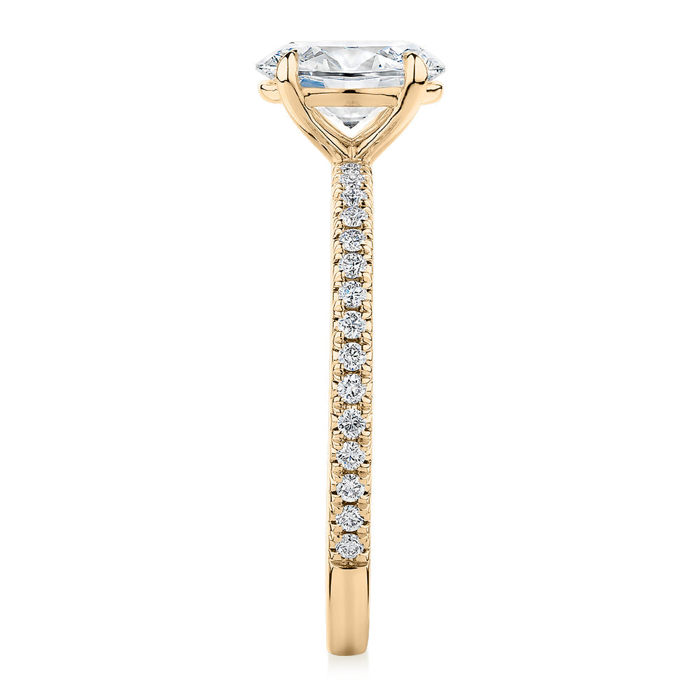 Signature Simulant Diamond 1.19 carat* TW round oval cut engagement ring in 10 carat yellow gold