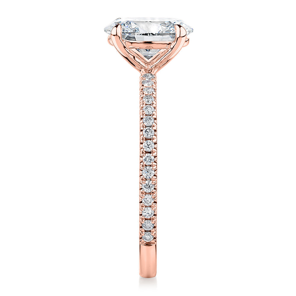 Signature Simulant Diamond 1.79 carat* TW oval cut shouldered engagement ring in 10 carat rose gold