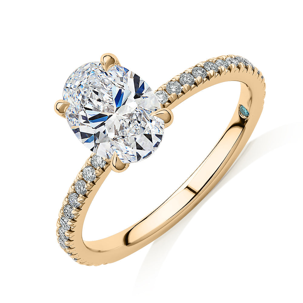 Premium Certified Laboratory Created Diamond, 1.74 carat TW oval and round brilliant shouldered engagement ring in 18 carat yellow gold