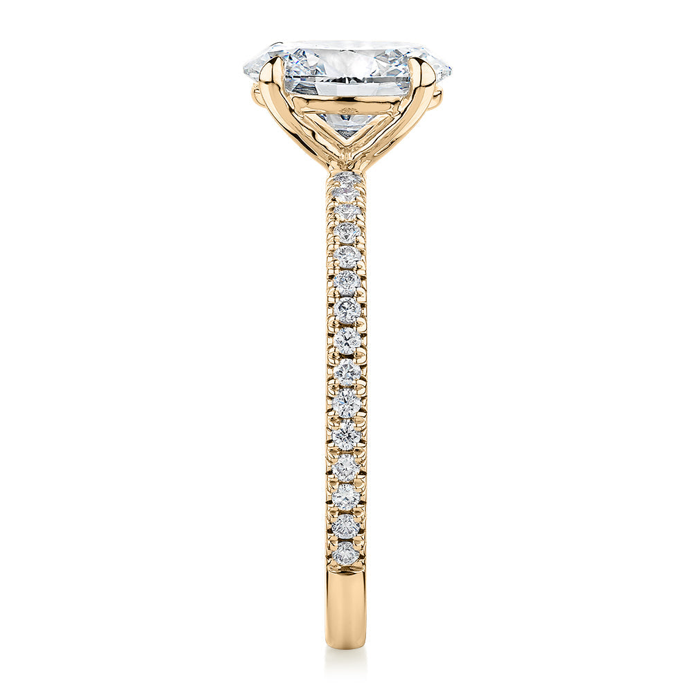 Signature Simulant Diamond 1.79 carat* TW round oval cut engagement ring in 10 carat yellow gold