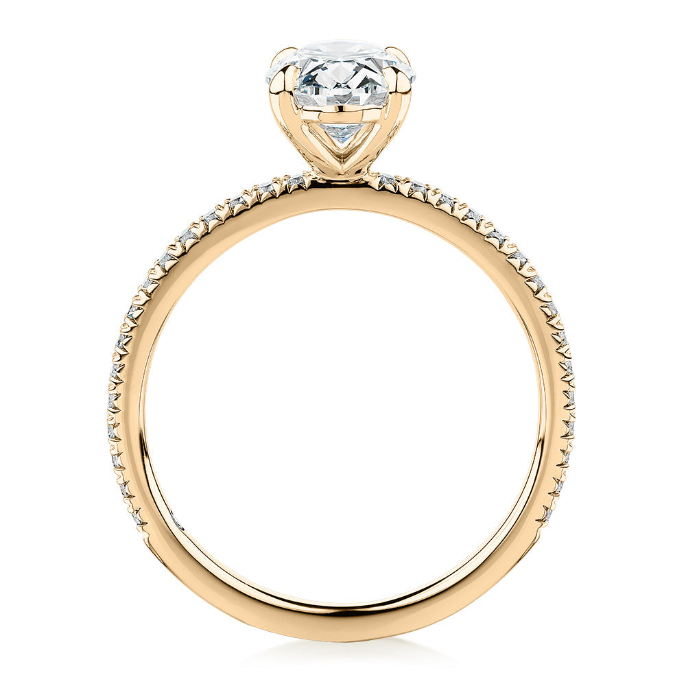 Signature Simulant Diamond 1.79 carat* TW round oval cut engagement ring in 10 carat yellow gold
