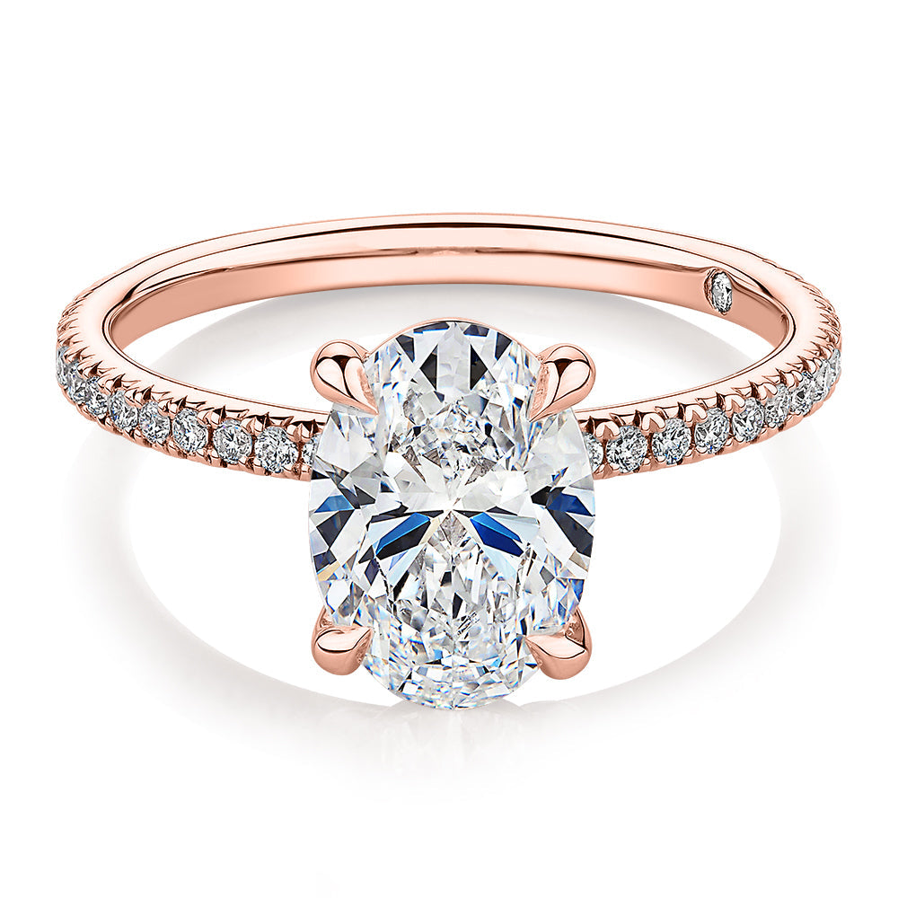Signature Simulant Diamond 2.19 carat* TW oval cut shouldered engagement ring in 10 carat rose gold