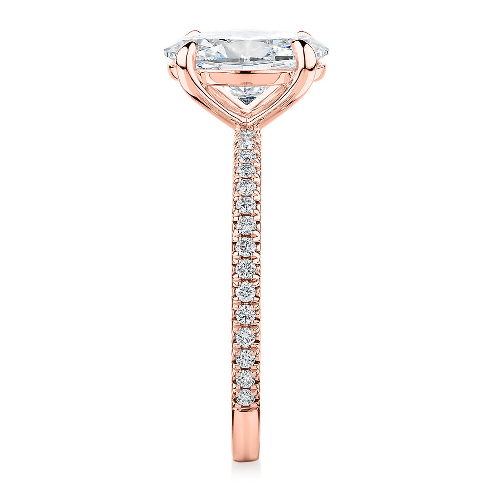 Signature Simulant Diamond 2.19 carat* TW oval cut shouldered engagement ring in 10 carat rose gold