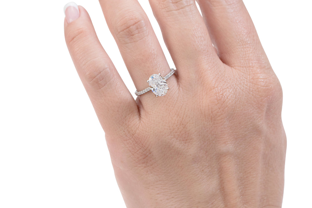 Signature Simulant Diamond 2.19 carat* TW oval cut shouldered engagement ring in 10 carat white gold