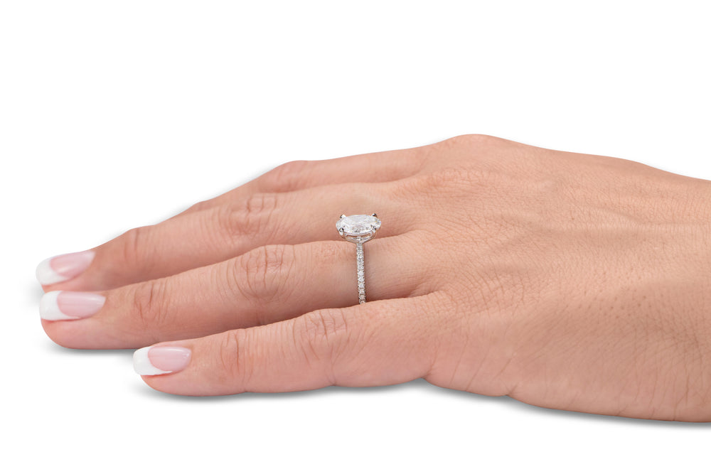 Signature Simulant Diamond 2.19 carat* TW oval cut shouldered engagement ring in 10 carat white gold