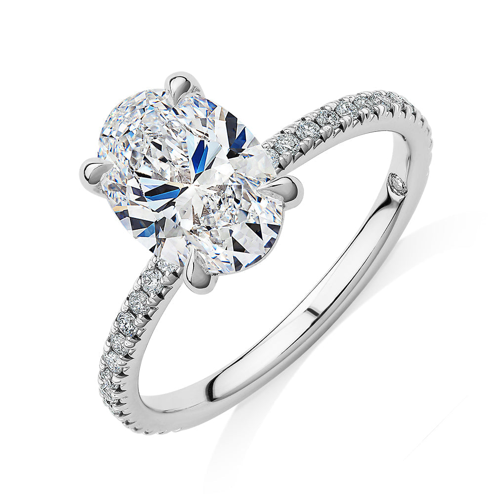 Signature Simulant Diamond 2.19 carat* TW oval cut shouldered engagement ring in 10 carat white gold