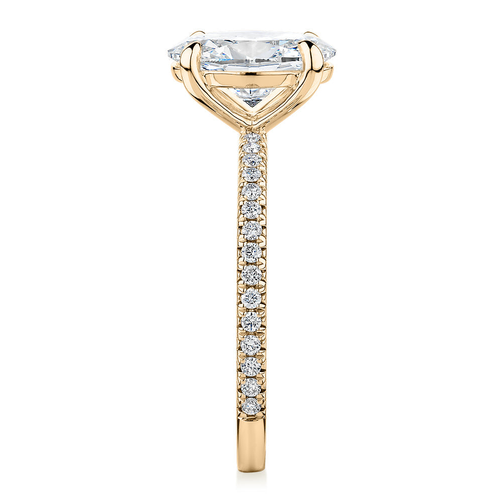 Signature Simulant Diamond 2.19 carat* TW round oval cut engagement ring in 10 carat yellow gold