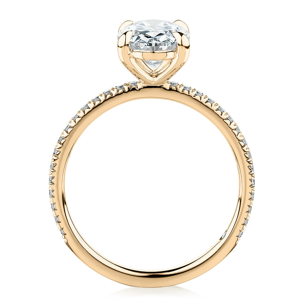 Signature Simulant Diamond 2.19 carat* TW round oval cut engagement ring in 10 carat yellow gold