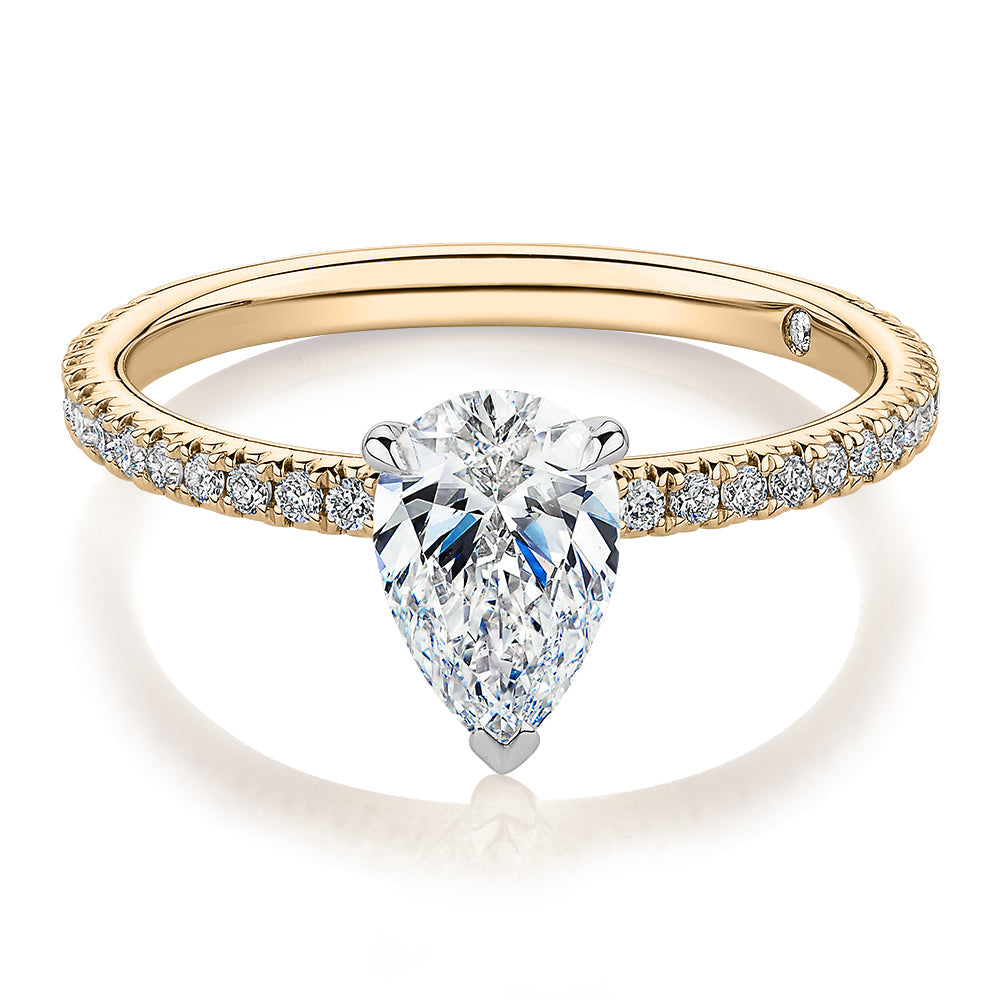 Signature Simulant Diamond 1.24 carat* TW pear and round brilliant shouldered engagement ring in 10 carat yellow and white gold