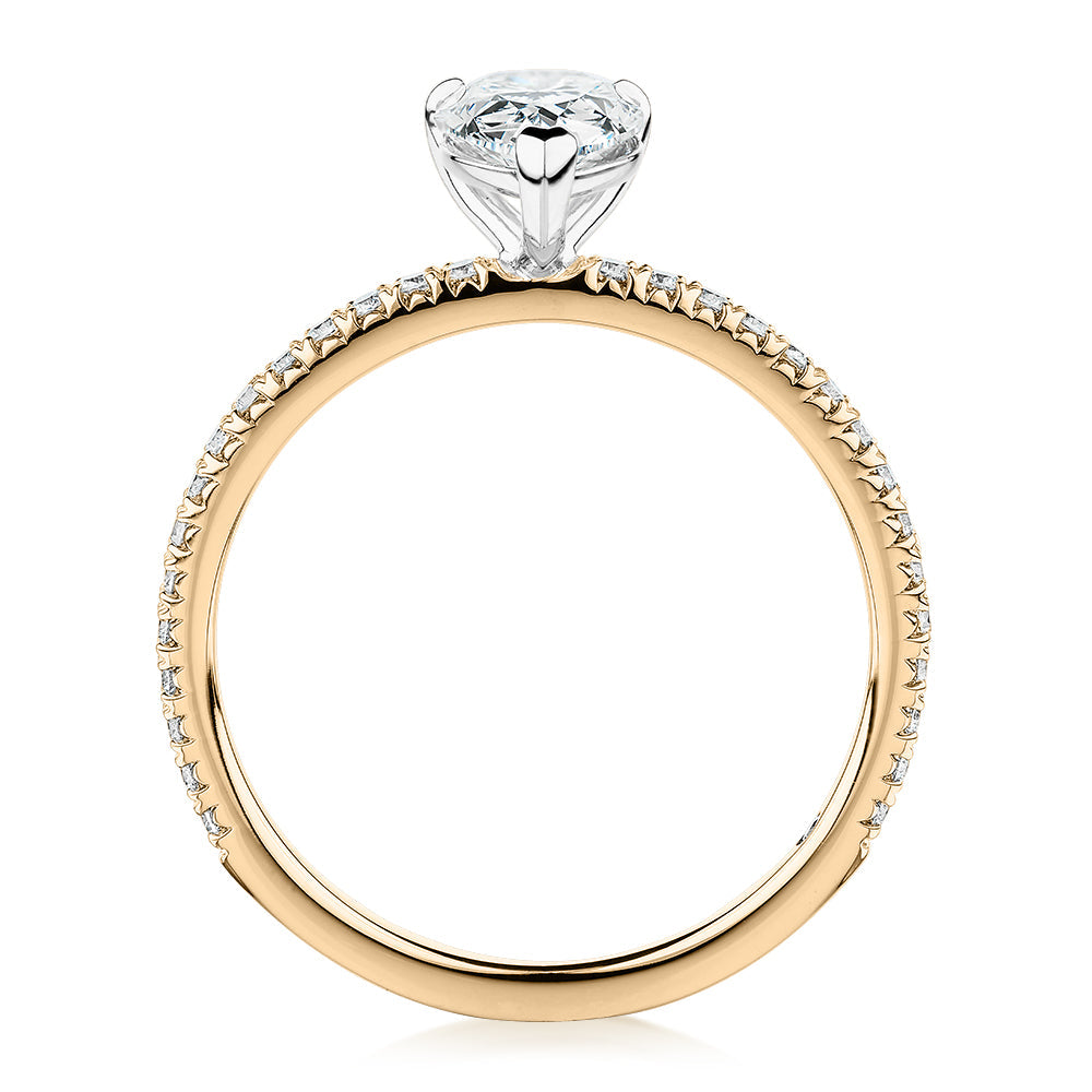 Signature Simulant Diamond 1.24 carat* TW pear and round brilliant shouldered engagement ring in 10 carat yellow and white gold