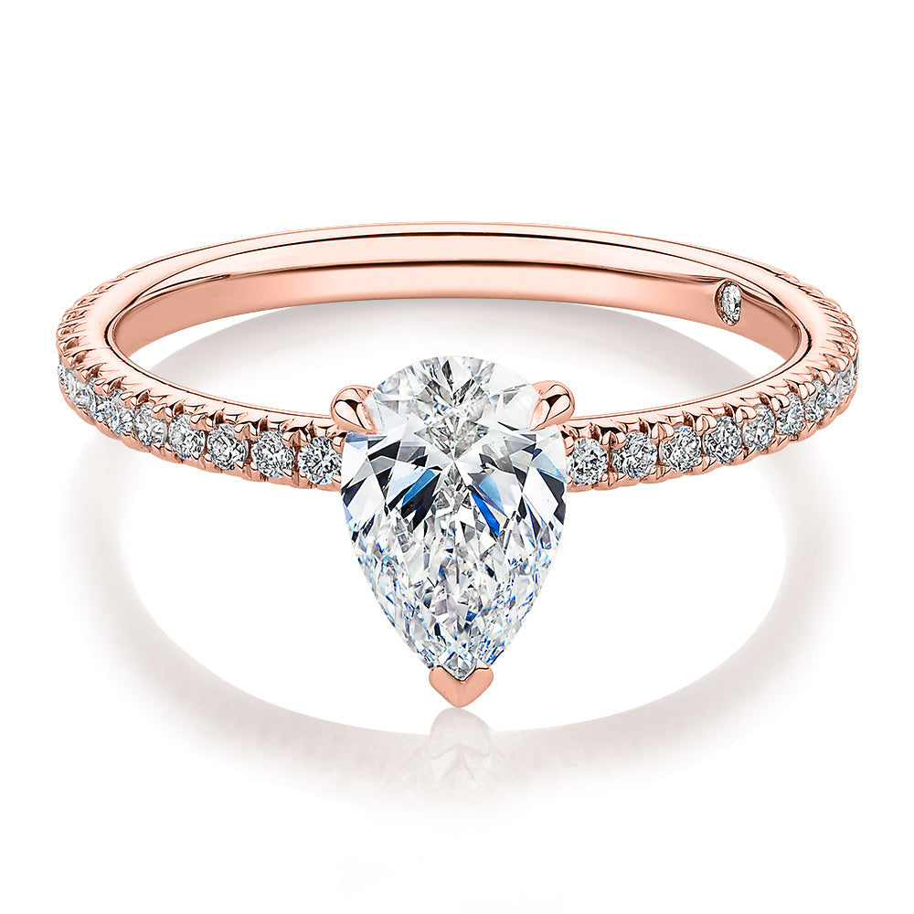 Signature Simulant Diamond 1.24 carat* TW pear and round brilliant shouldered engagement ring in 10 carat rose gold
