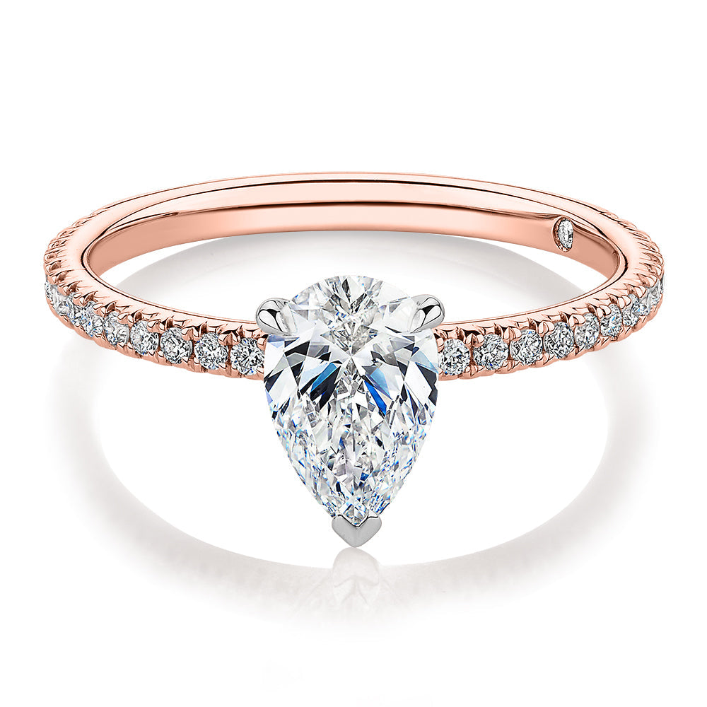 Signature Simulant Diamond 1.24 carat* TW pear and round brilliant shouldered engagement ring in 14 carat rose and white gold