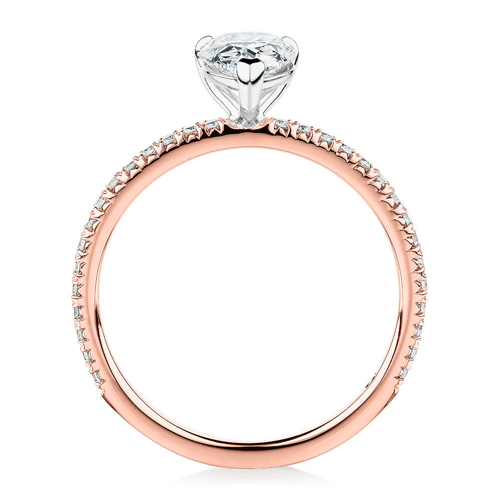 Signature Simulant Diamond 1.24 carat* TW pear and round brilliant shouldered engagement ring in 14 carat rose and white gold