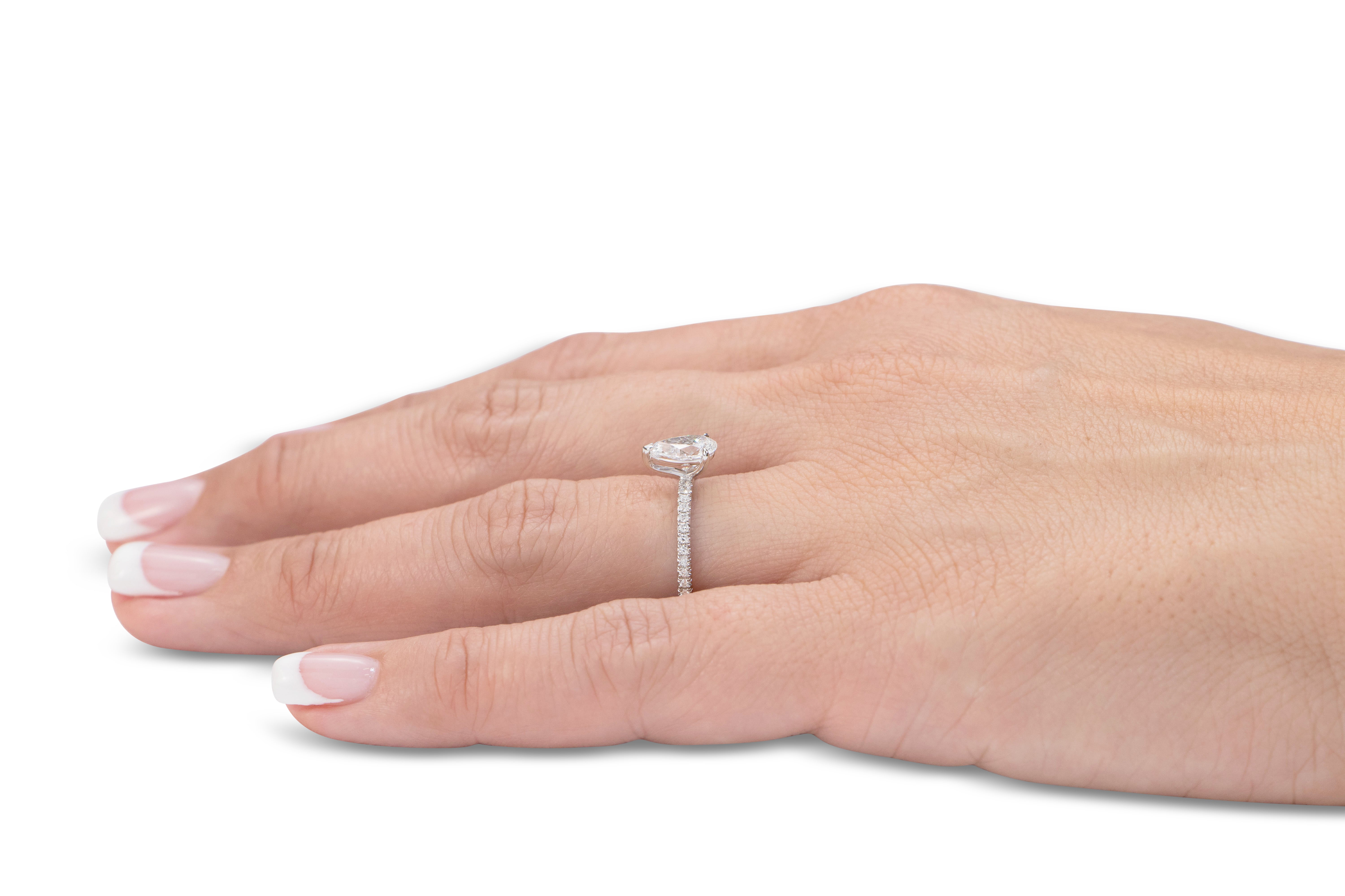 Signature Simulant Diamond 1.24 carat* TW pear and round brilliant shouldered engagement ring in 10 carat white gold