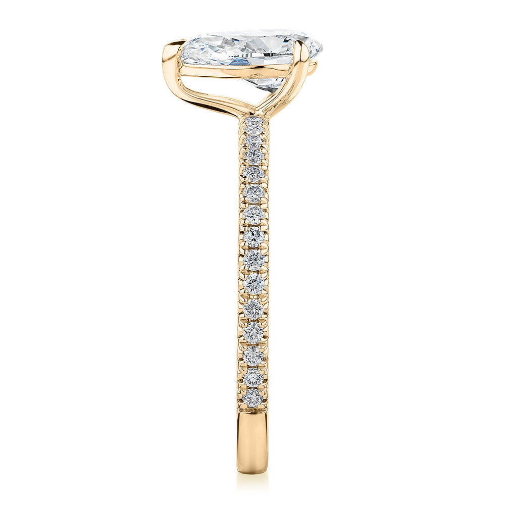 Signature Simulant Diamond 1.24 carat* TW pear and round brilliant shouldered engagement ring in 10 carat yellow gold