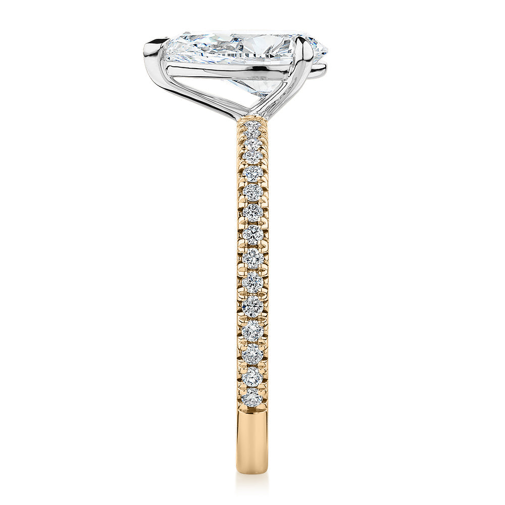 Signature Simulant Diamond 1.74 carat* TW pear and round brilliant shouldered engagement ring in 10 carat yellow and white gold