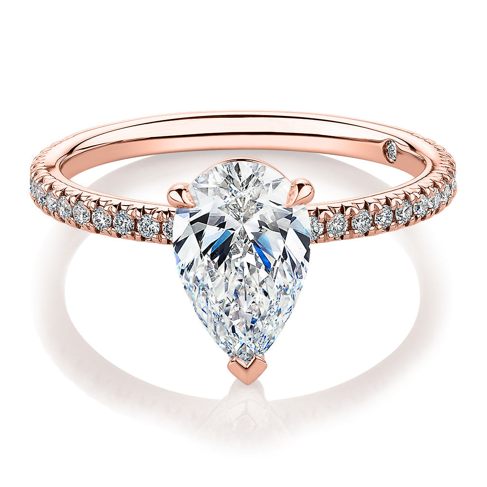 Signature Simulant Diamond 1.74 carat* TW pear and round brilliant shouldered engagement ring in 10 carat rose gold