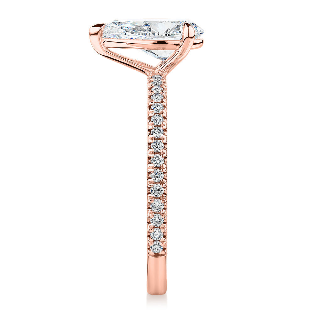 Signature Simulant Diamond 1.74 carat* TW pear and round brilliant shouldered engagement ring in 10 carat rose gold