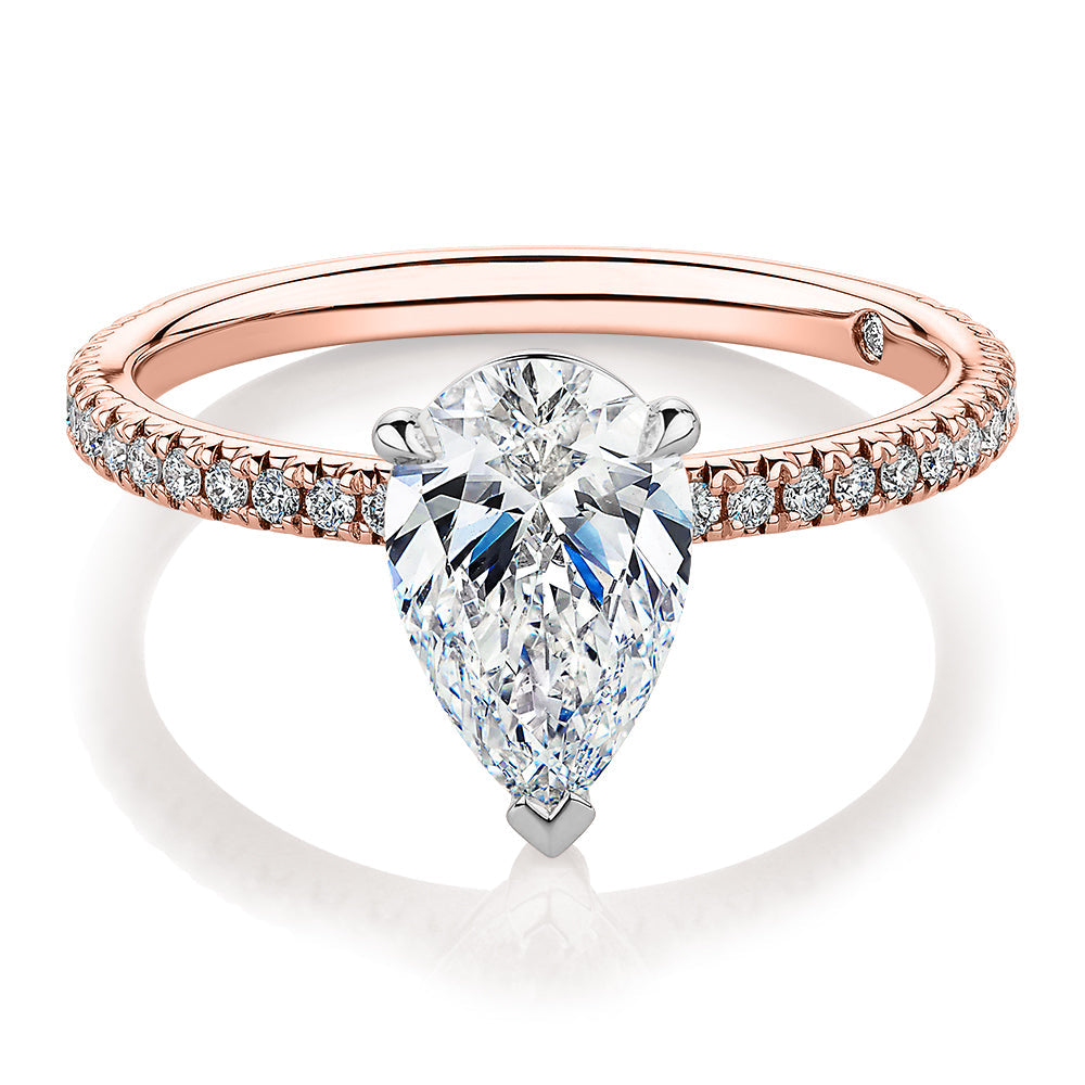 Signature Simulant Diamond 1.74 carat* TW pear and round brilliant shouldered engagement ring in 10 carat rose and white gold