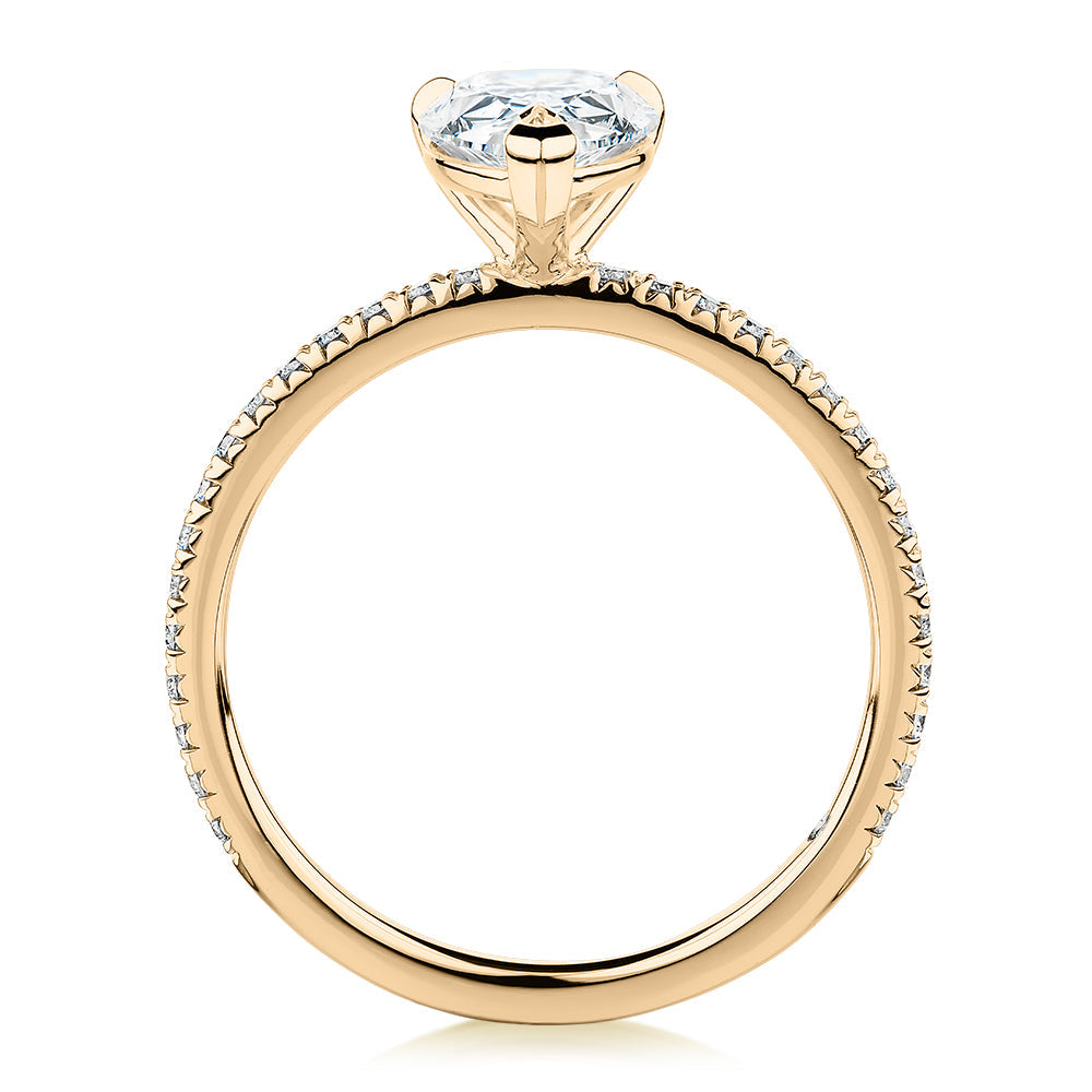 Signature Simulant Diamond 1.74 carat* TW pear and round brilliant shouldered engagement ring in 10 carat yellow gold