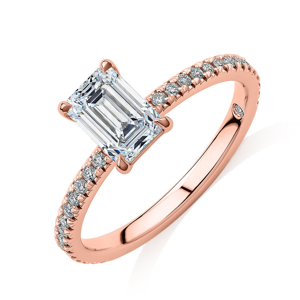 Signature Simulant Diamond 1.24 carat* TW emerald cut and round brilliant shouldered engagement ring in 10 carat rose gold