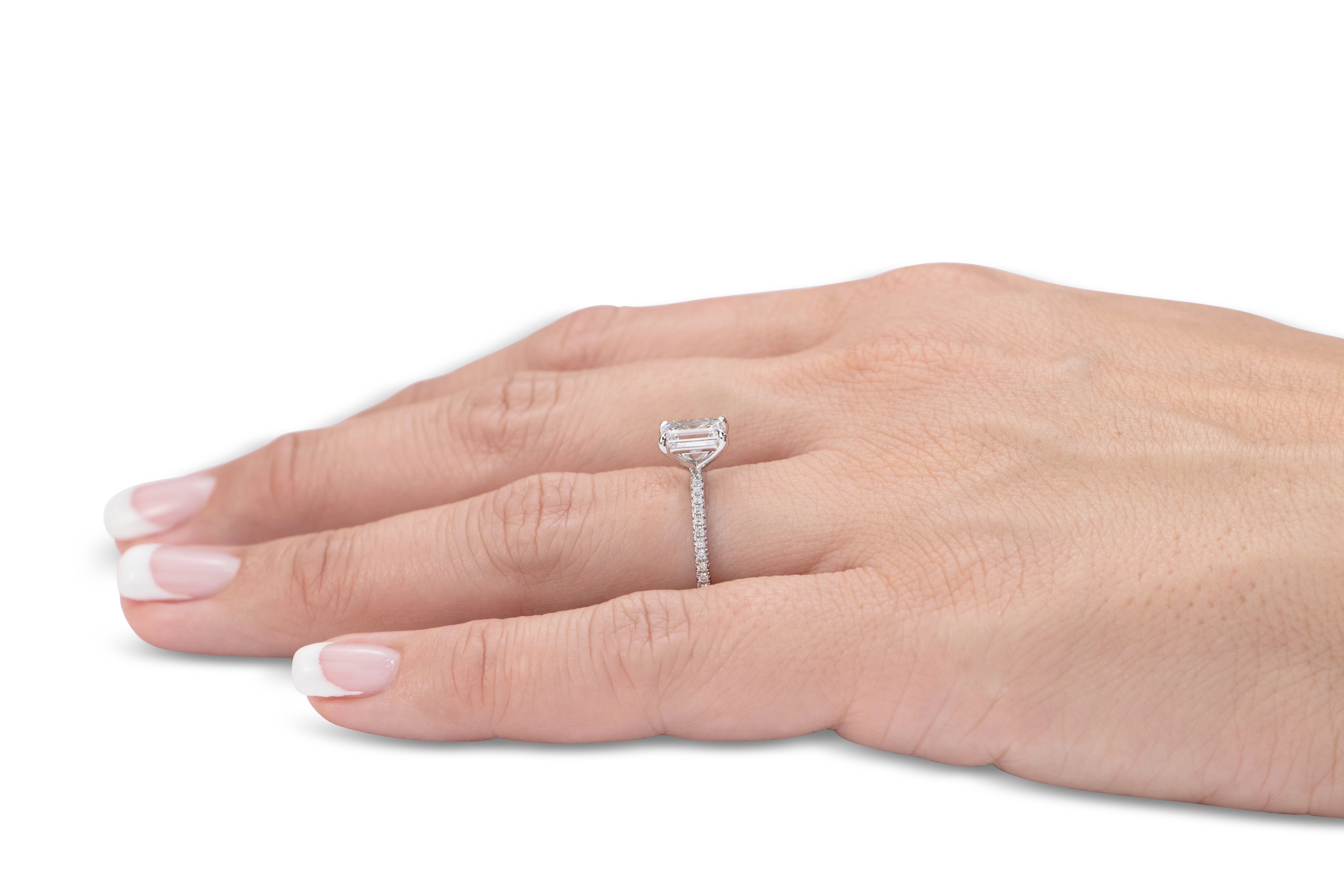 Signature Simulant Diamond 1.24 carat* TW emerald cut and round brilliant shouldered engagement ring in 10 carat white gold