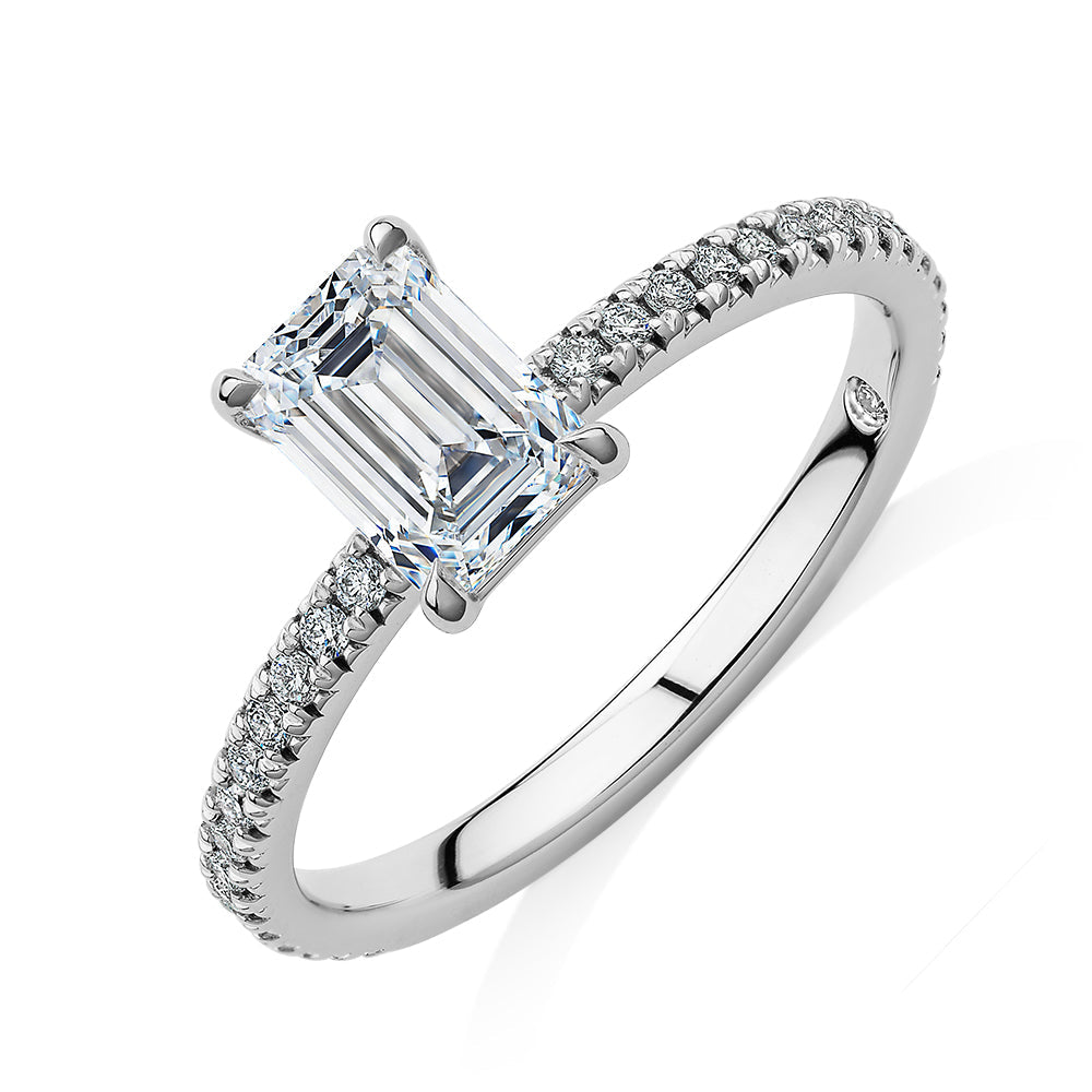 Signature Simulant Diamond 1.24 carat* TW emerald cut and round brilliant shouldered engagement ring in 10 carat white gold