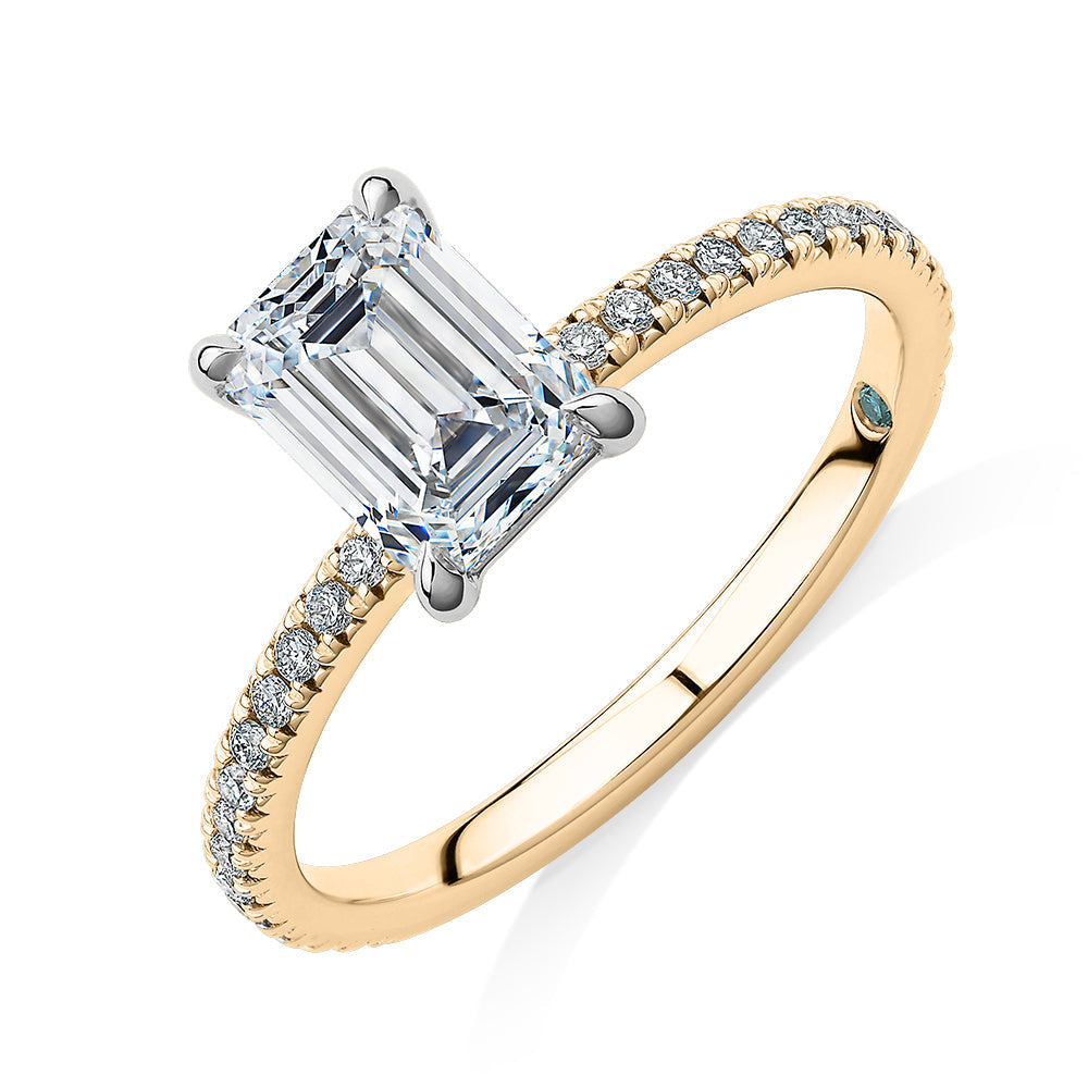 Premium Certified Lab-Grown Diamond, 1.74 carat TW emerald cut and round brilliant shouldered engagement ring in 14 carat yellow and white gold