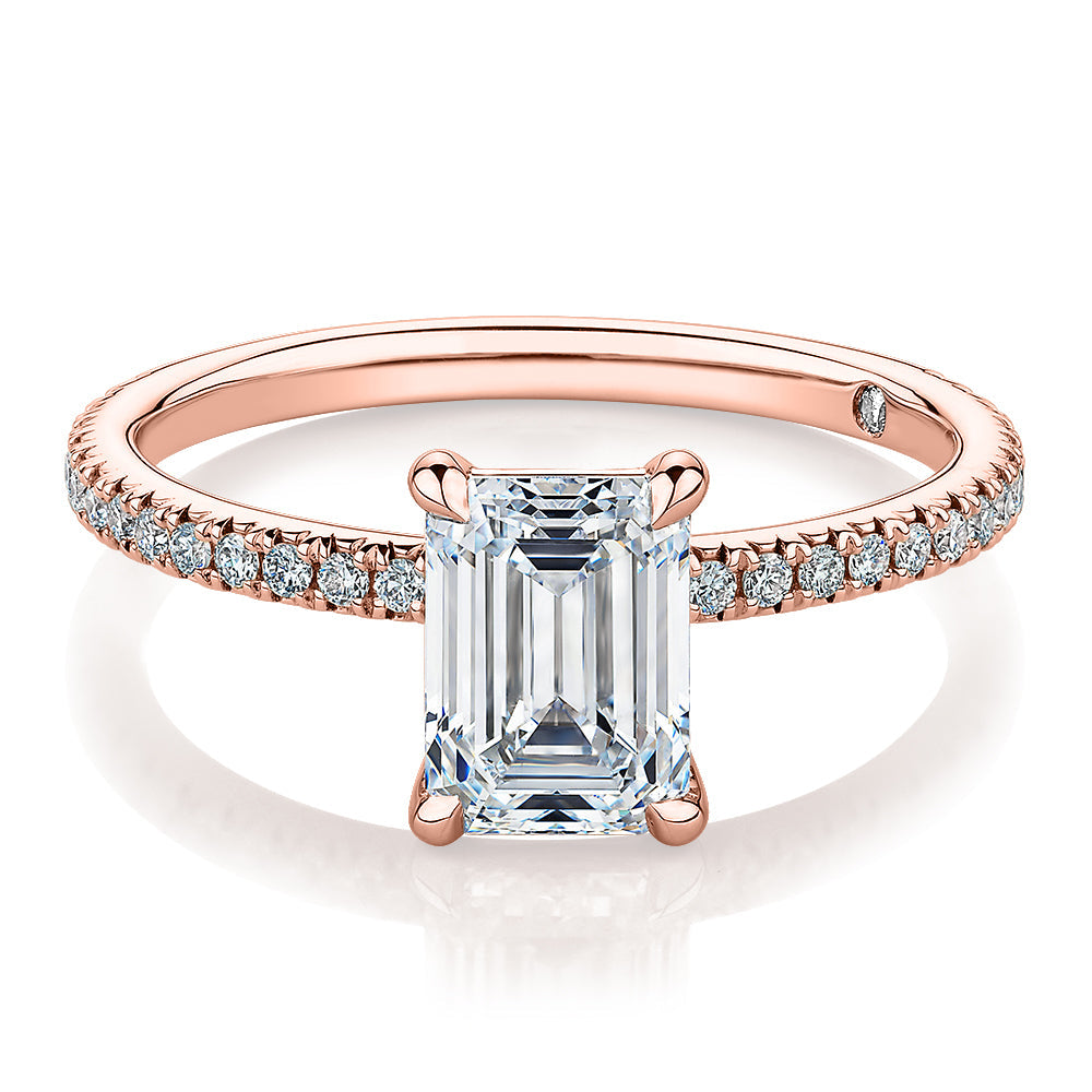 Signature Simulant Diamond 1.74 carat* TW emerald cut and round brilliant shouldered engagement ring in 10 carat rose gold