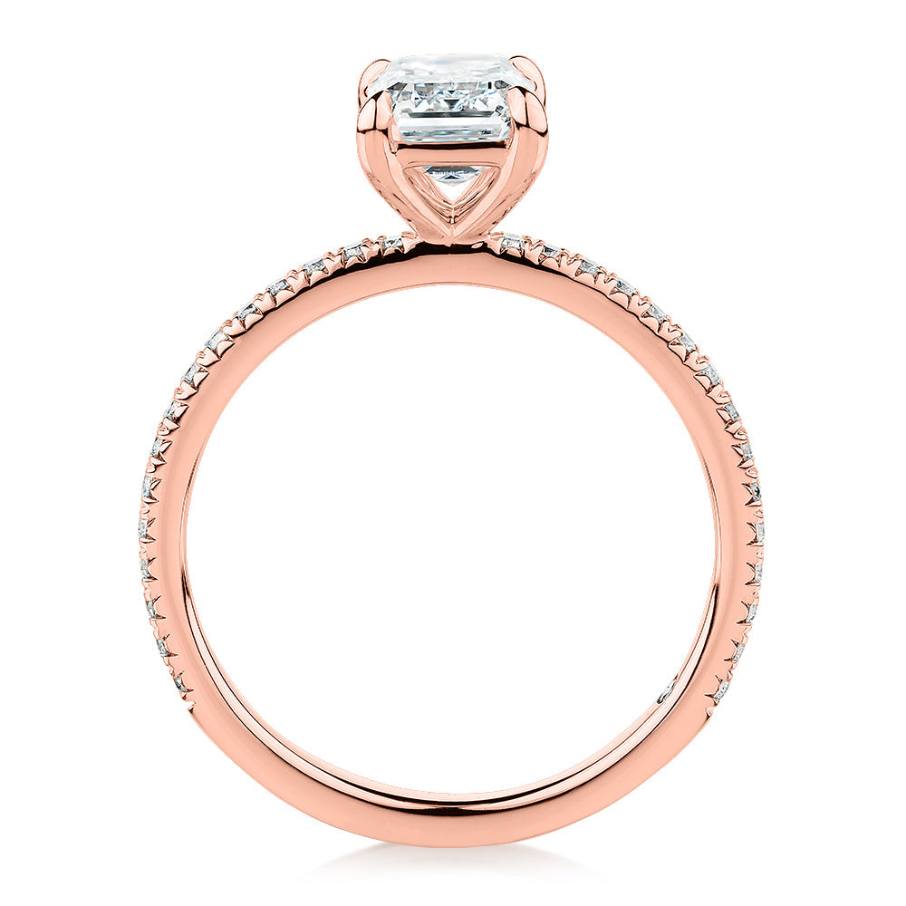 Signature Simulant Diamond 1.74 carat* TW emerald cut and round brilliant shouldered engagement ring in 10 carat rose gold