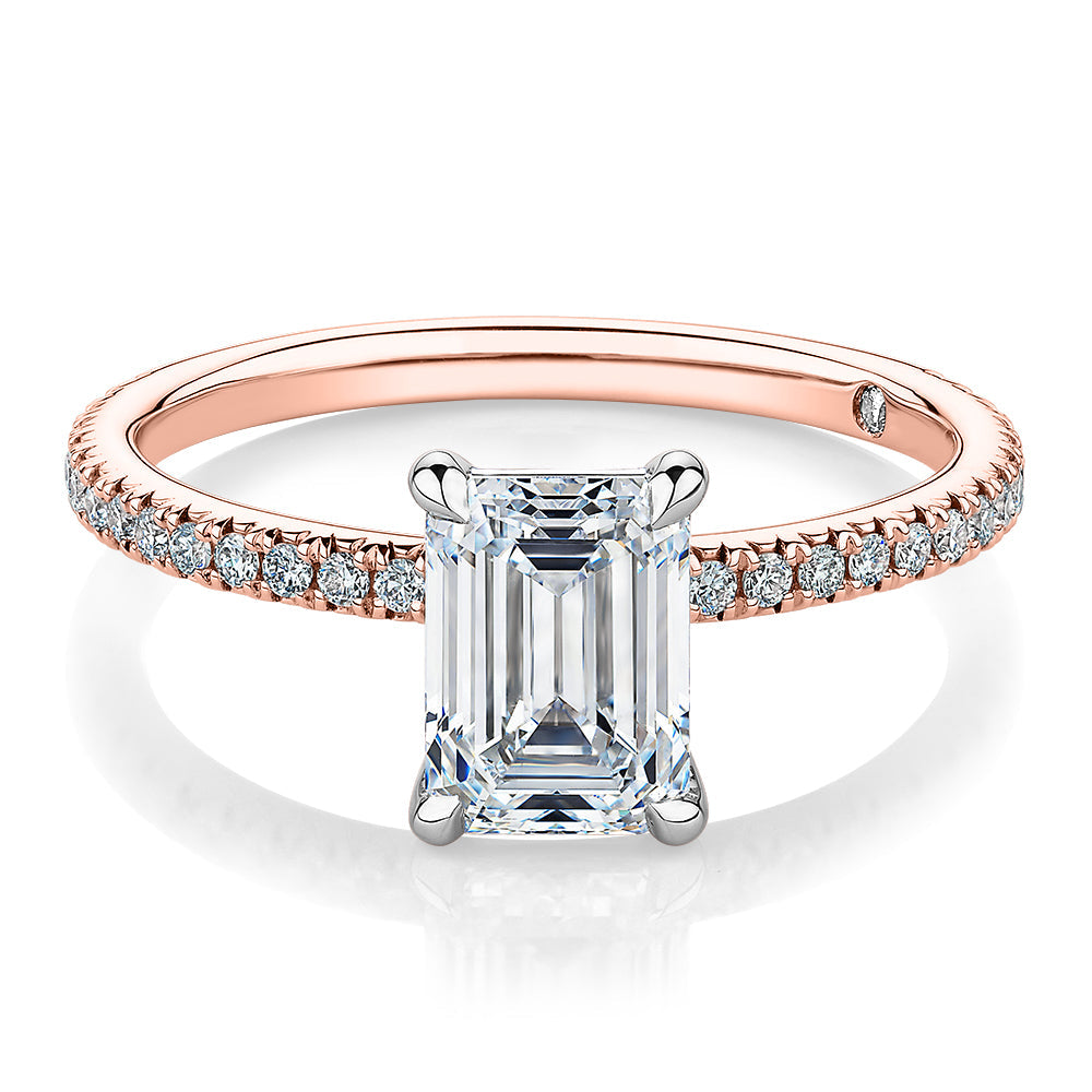 Signature Simulant Diamond 1.74 carat* TW emerald cut and round brilliant shouldered engagement ring in 10 carat rose and white gold