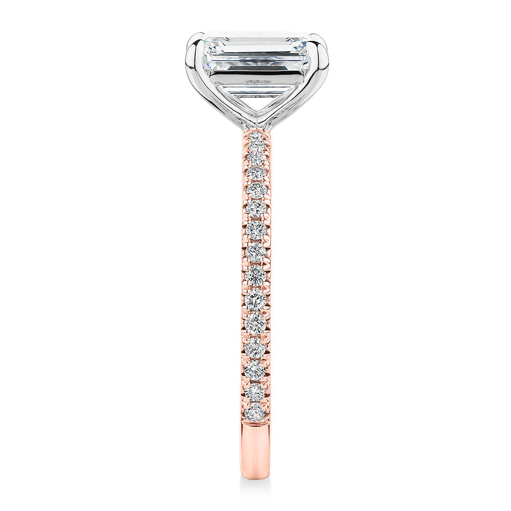 Signature Simulant Diamond 1.74 carat* TW emerald cut and round brilliant shouldered engagement ring in 10 carat rose and white gold