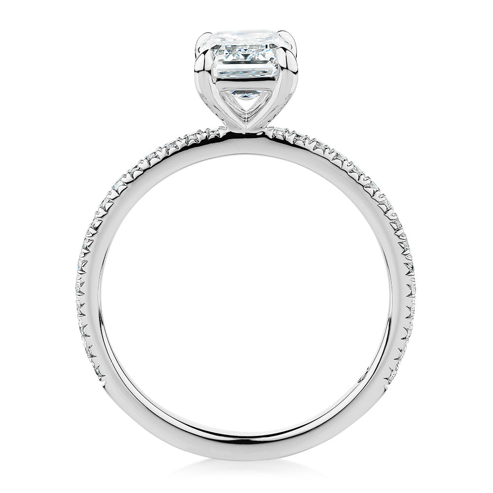 Signature Simulant Diamond 1.74 carat* TW emerald cut and round brilliant shouldered engagement ring in 10 carat white gold
