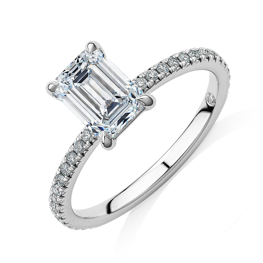 Signature Simulant Diamond 1.74 carat* TW emerald cut and round brilliant shouldered engagement ring in 10 carat white gold