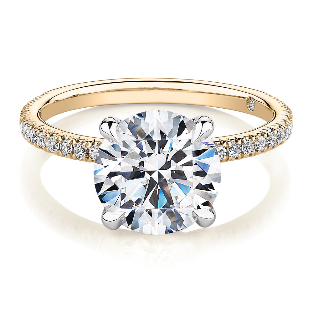 Signature Simulant Diamond 3.24 carat* TW round brilliant shouldered engagement ring in 14 carat yellow and white gold