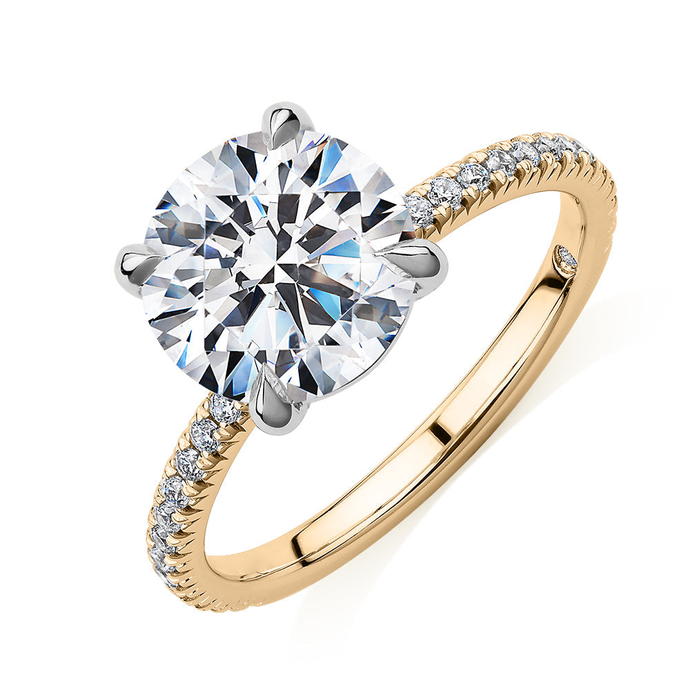 Signature Simulant Diamond 3.24 carat* TW round brilliant shouldered engagement ring in 14 carat yellow and white gold
