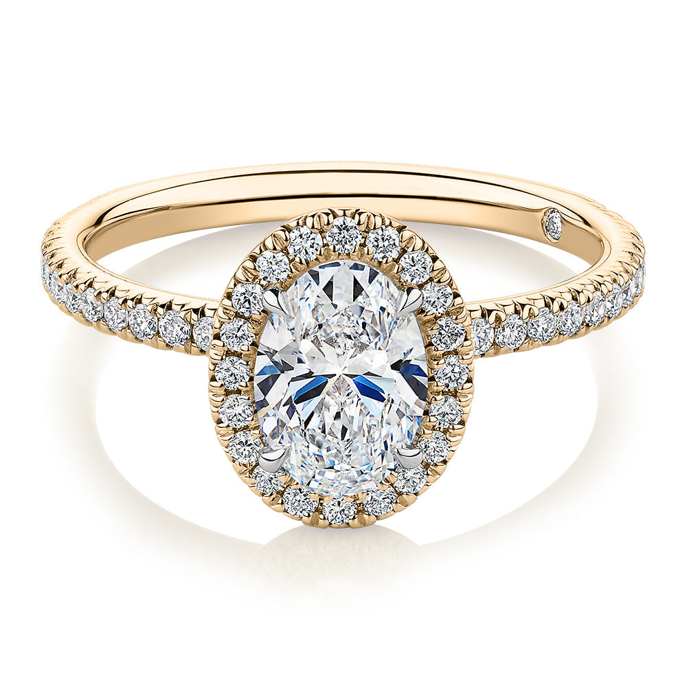 Signature Simulant Diamond 1.37 carat* TW oval and round brilliant halo engagement ring in 10 carat yellow and white gold