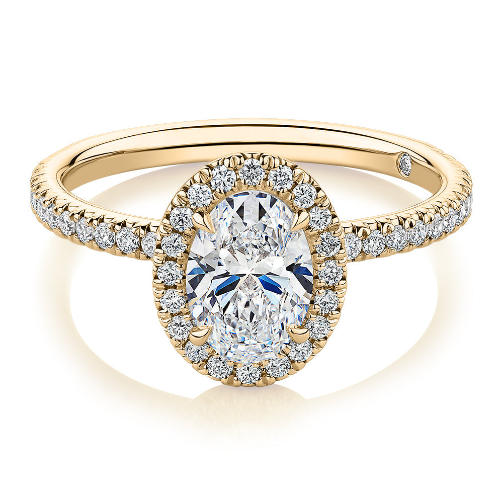 Signature Simulant Diamond 1.37 carat* TW oval and round brilliant halo engagement ring in 10 carat yellow gold