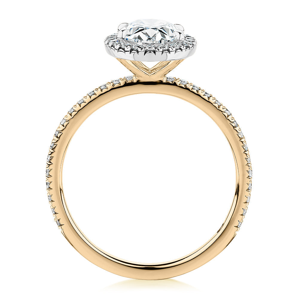 Signature Simulant Diamond 1.89 carat* TW oval and round brilliant halo engagement ring in 18 carat yellow and white gold