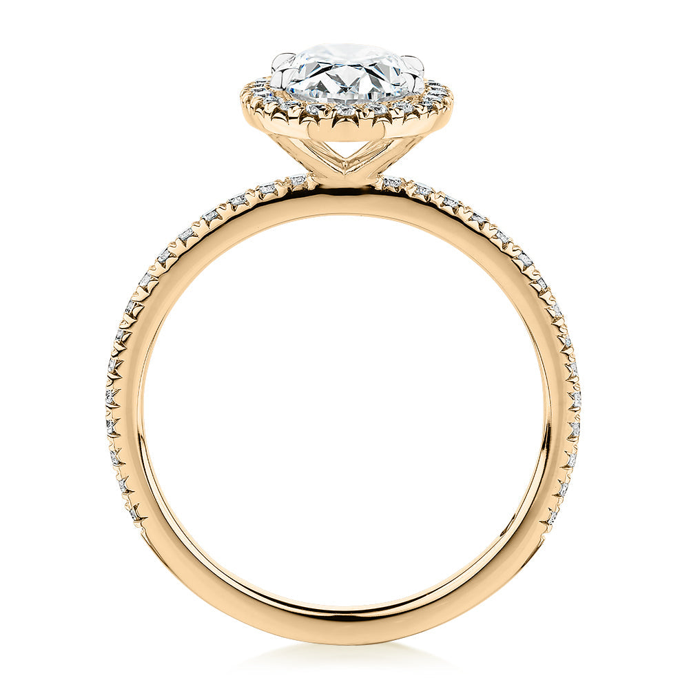 Signature Simulant Diamond 1.83 carat* TW oval and round brilliant halo engagement ring in 10 carat yellow and white gold