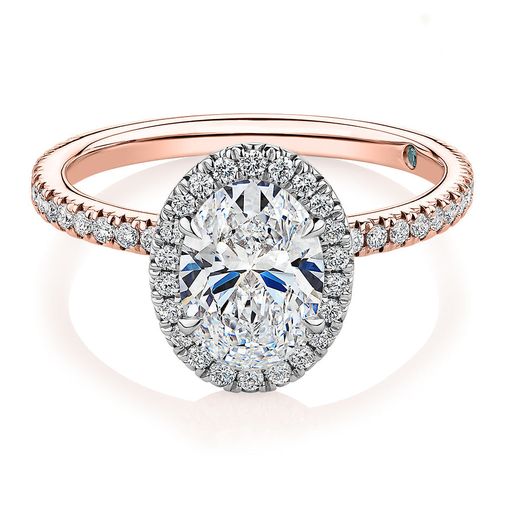 Signature Simulant Diamond 1.89 carat* TW oval and round brilliant halo engagement ring in 18 carat rose and white gold