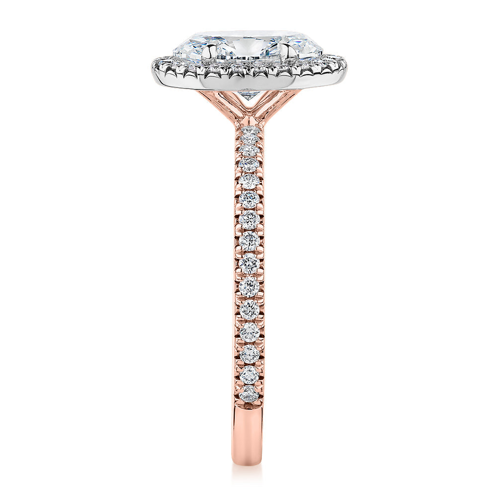 Signature Simulant Diamond 1.89 carat* TW oval and round brilliant halo engagement ring in 18 carat rose and white gold