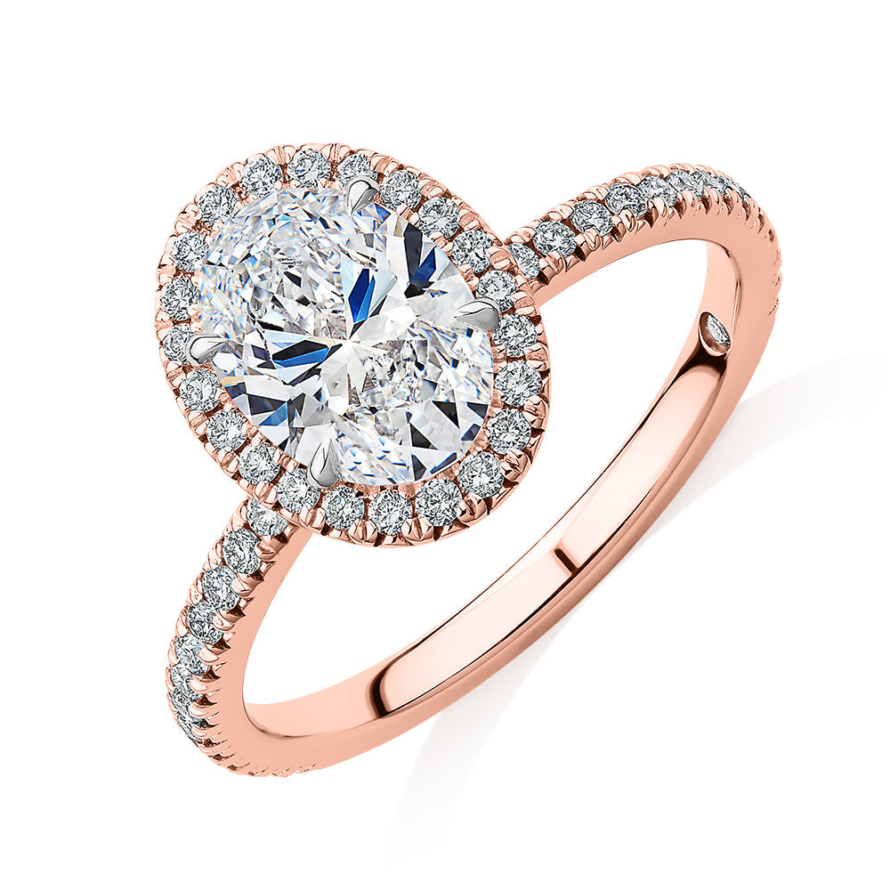 Signature Simulant Diamond 1.83 carat* TW oval and round brilliant halo engagement ring in 10 carat rose and white gold