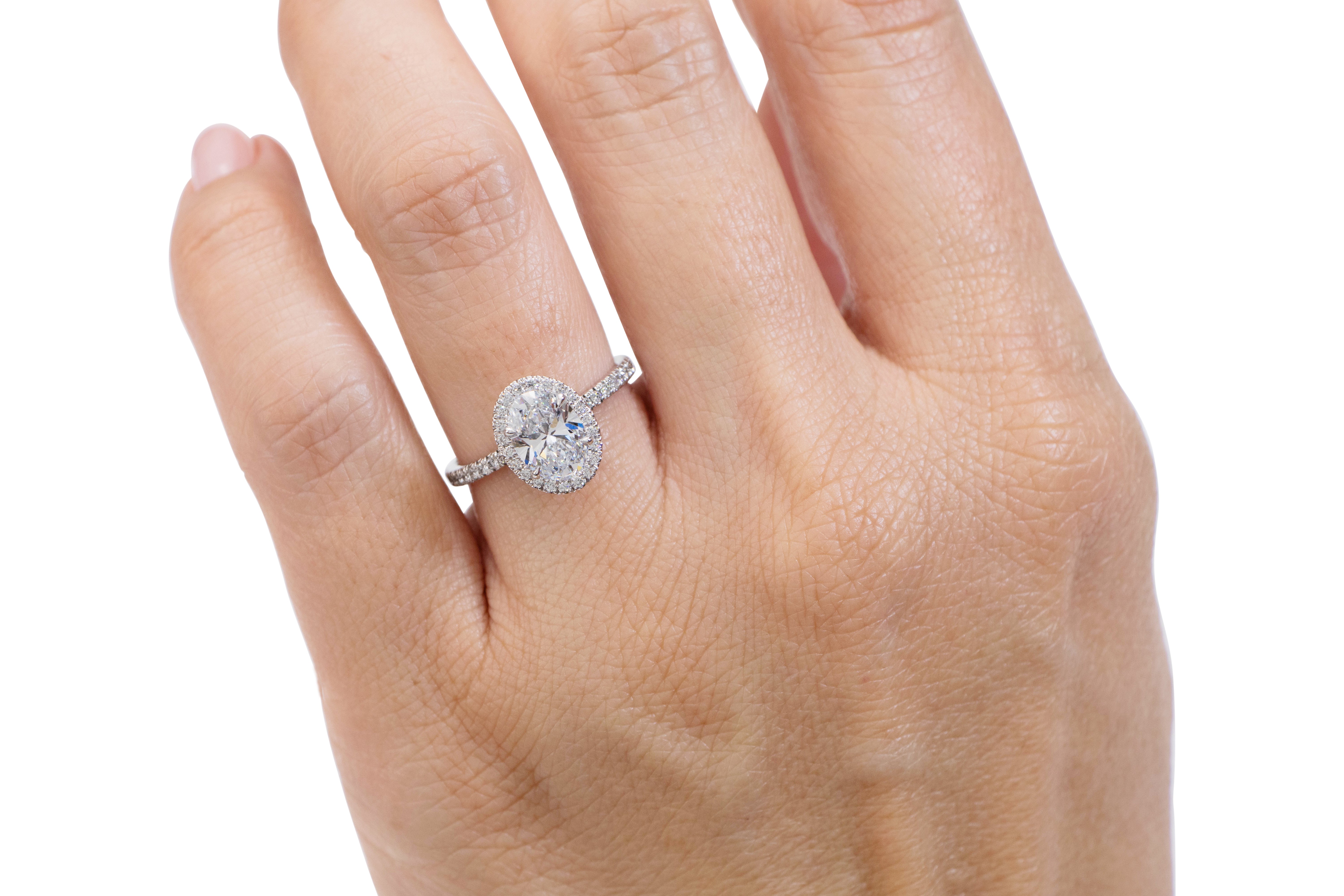 Signature Simulant Diamond 1.83 carat* TW oval and round brilliant halo engagement ring in 10 carat white gold