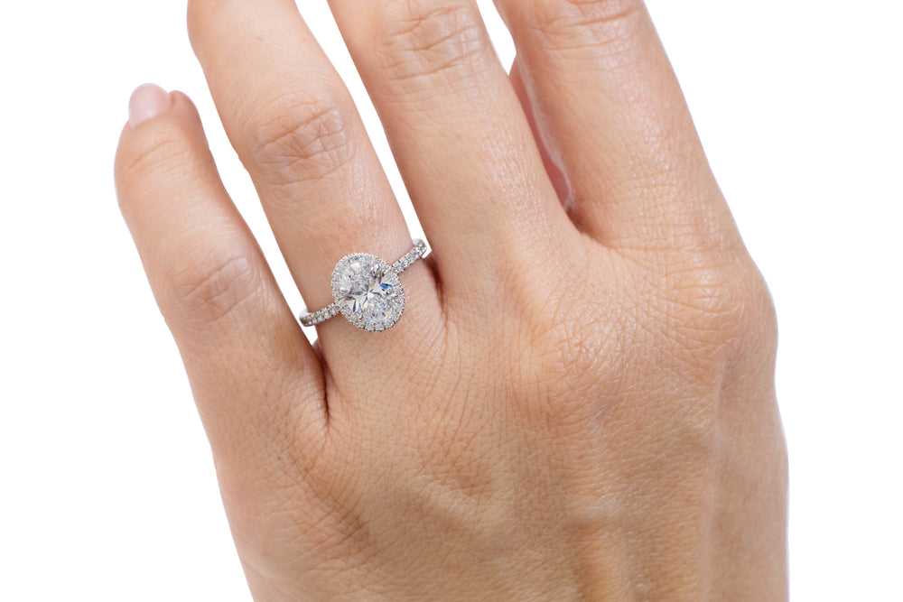 Signature Simulant Diamond 1.83 carat* TW oval and round brilliant halo engagement ring in 10 carat white gold