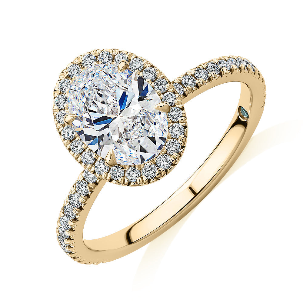 Signature Simulant Diamond 1.89 carat* TW oval and round brilliant halo engagement ring in 18 carat yellow gold