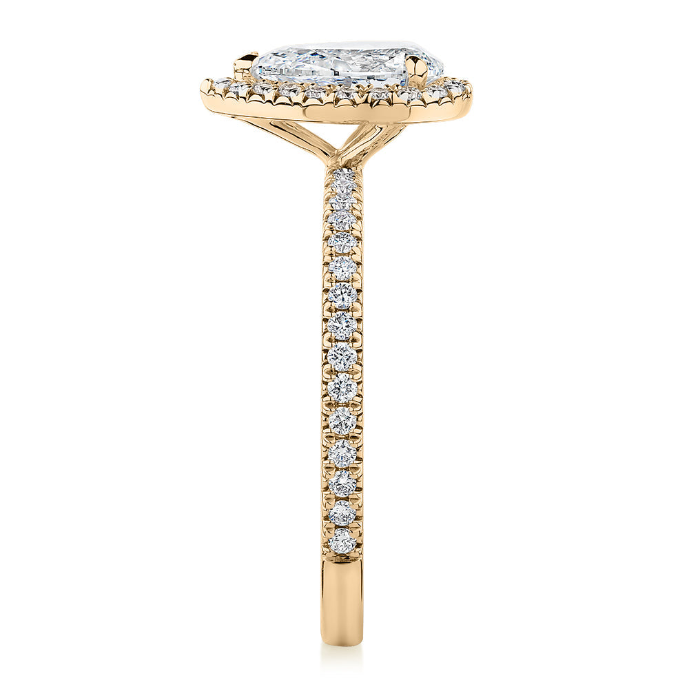 Signature Simulant Diamond 1.37 carat* TW pear and round brilliant halo engagement ring in 10 carat yellow gold